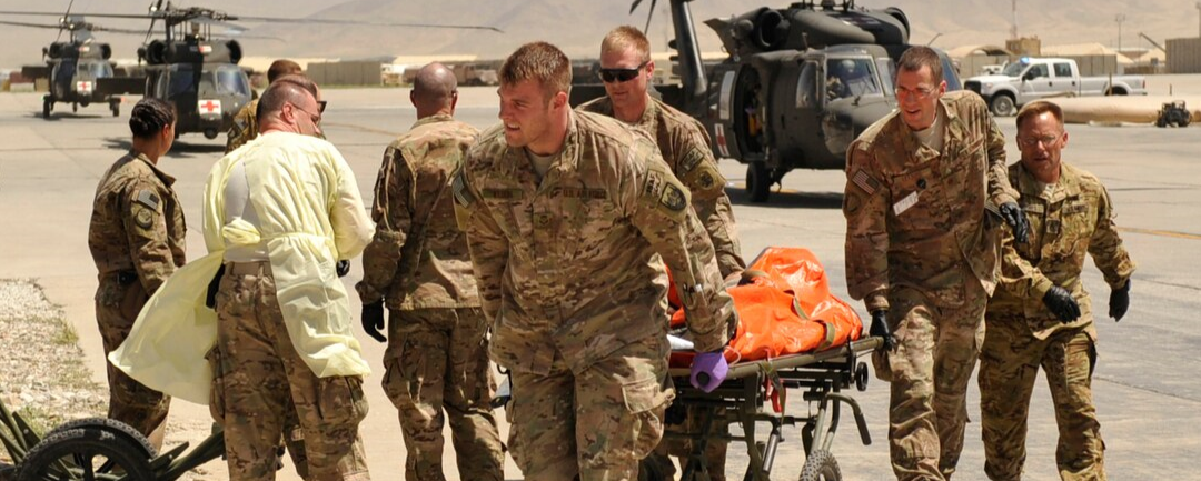 military personnel and helicopter